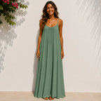 Women's ocean green backless cami maxi dress with a loose flowy silhouette.
