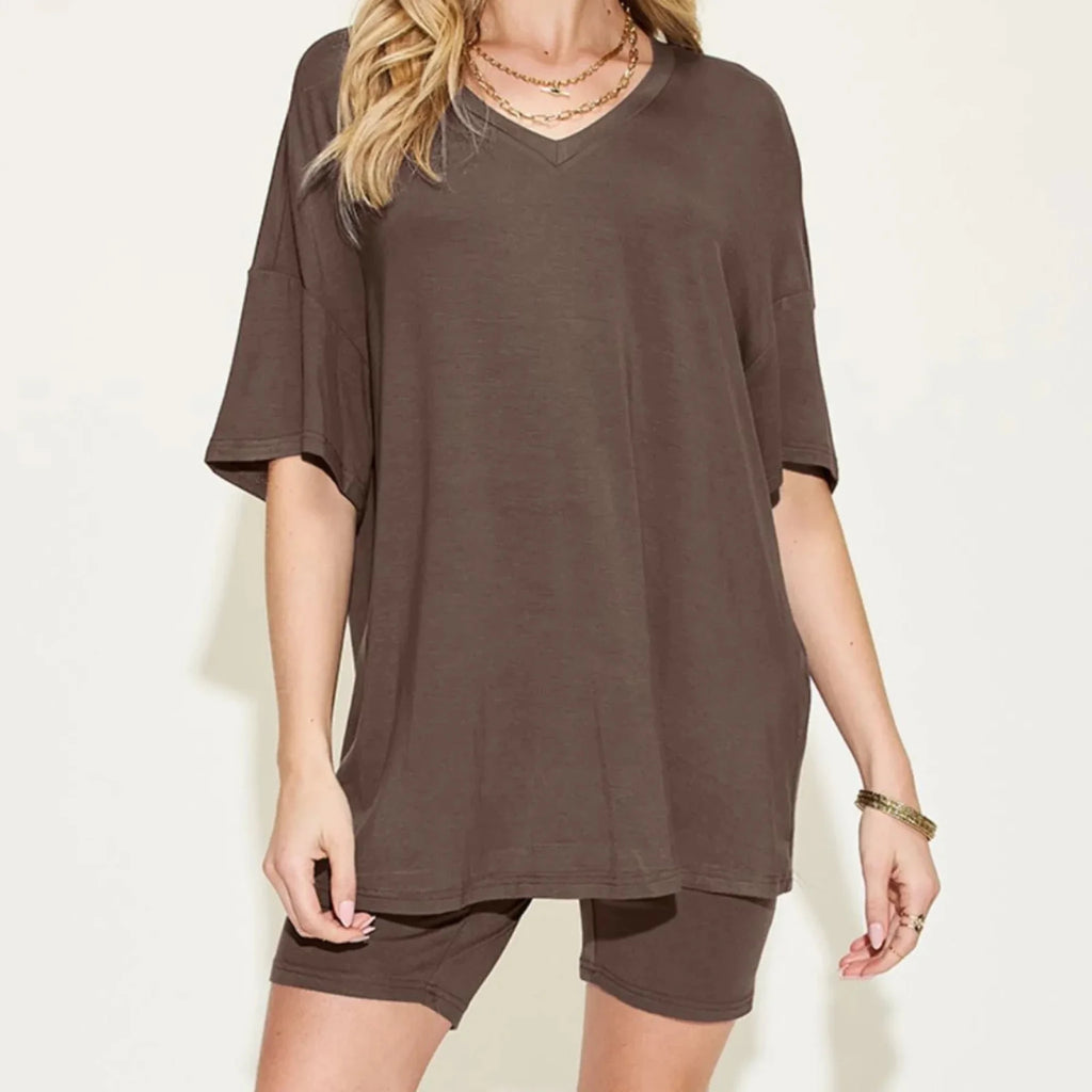 Women's chocolate brown oversized lounge set featuring a relaxed V-neck top with matching biker shorts.