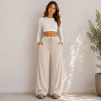 Beige flowy drawstring-waist wide-leg pants with pockets