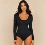 Women's black scoop neck long sleeve bodysuit with a sleek fitted silhouette.