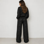 Black sequin long-sleeve sweatshirt and wide-leg pants set for women, back view