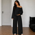Black women's two-piece wide-leg pants set with off-shoulder long sleeve top