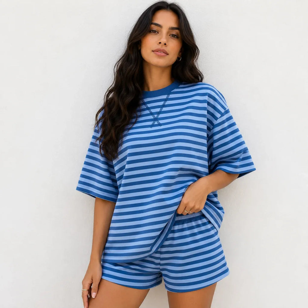 Model wearing royal blue and light blue horizontal striped short-sleeve two-piece lounge set