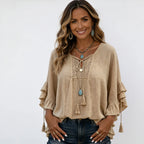 Women's khaki boho lace trim tassel tie V-neck blouse featuring textured woven fabric, lace detailing, and layered ruffle sleeves.