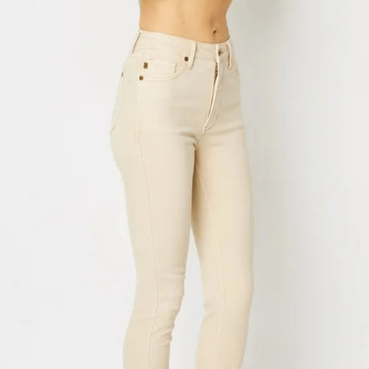 Side view showcasing the flattering fit of the Bone skinny jeans.