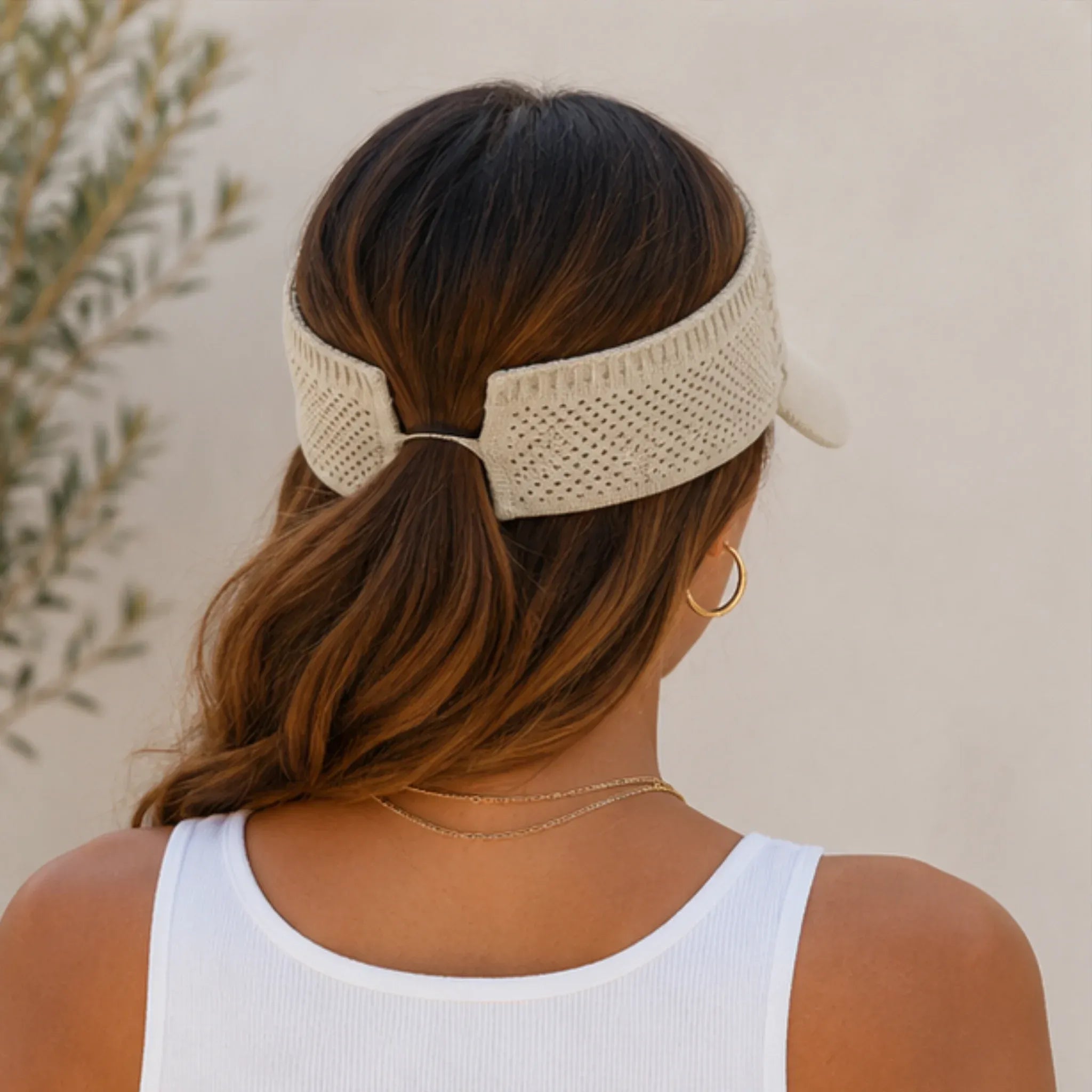 Back view of the breathable knit sun visor hat in khaki with an open-back design ideal for ponytails and all-day comfort.