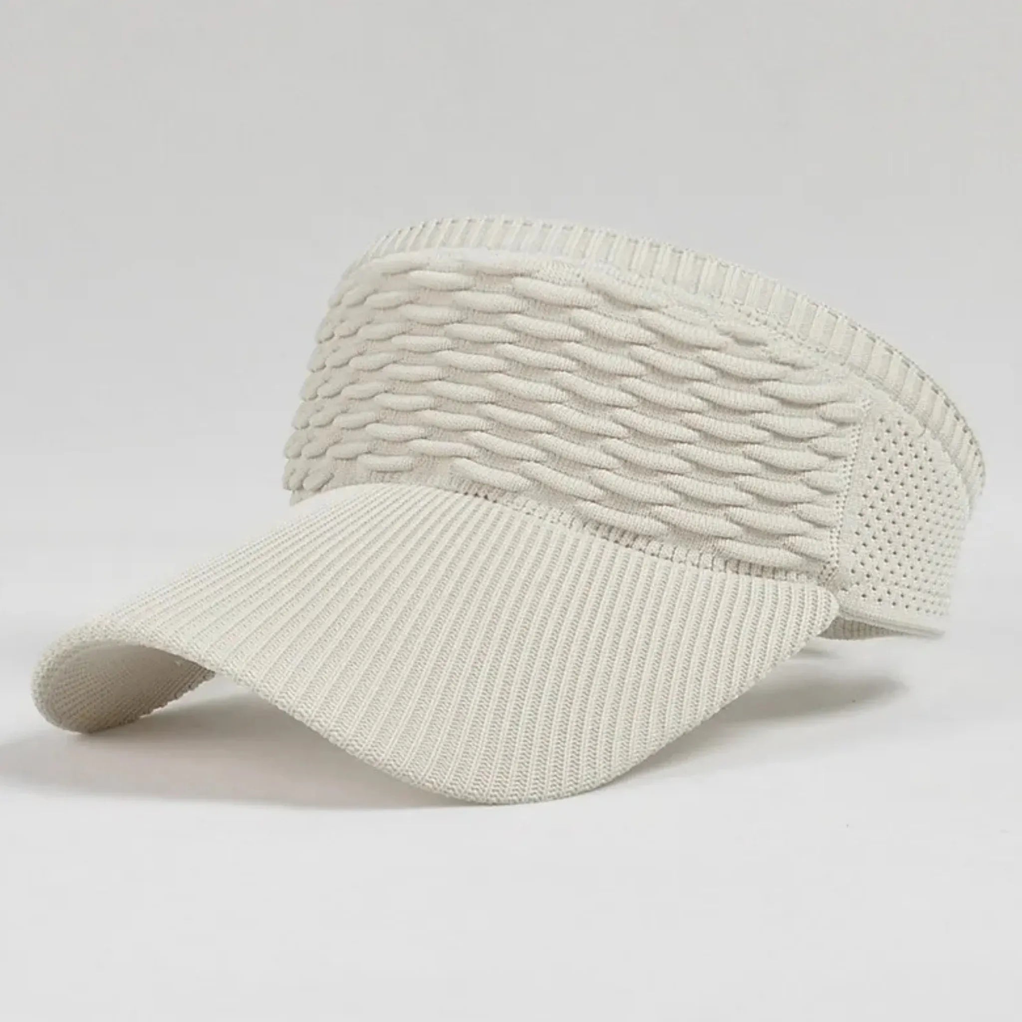 Apricot breathable knit sun visor hat featuring a soft knit construction, textured design, and lightweight curved brim.