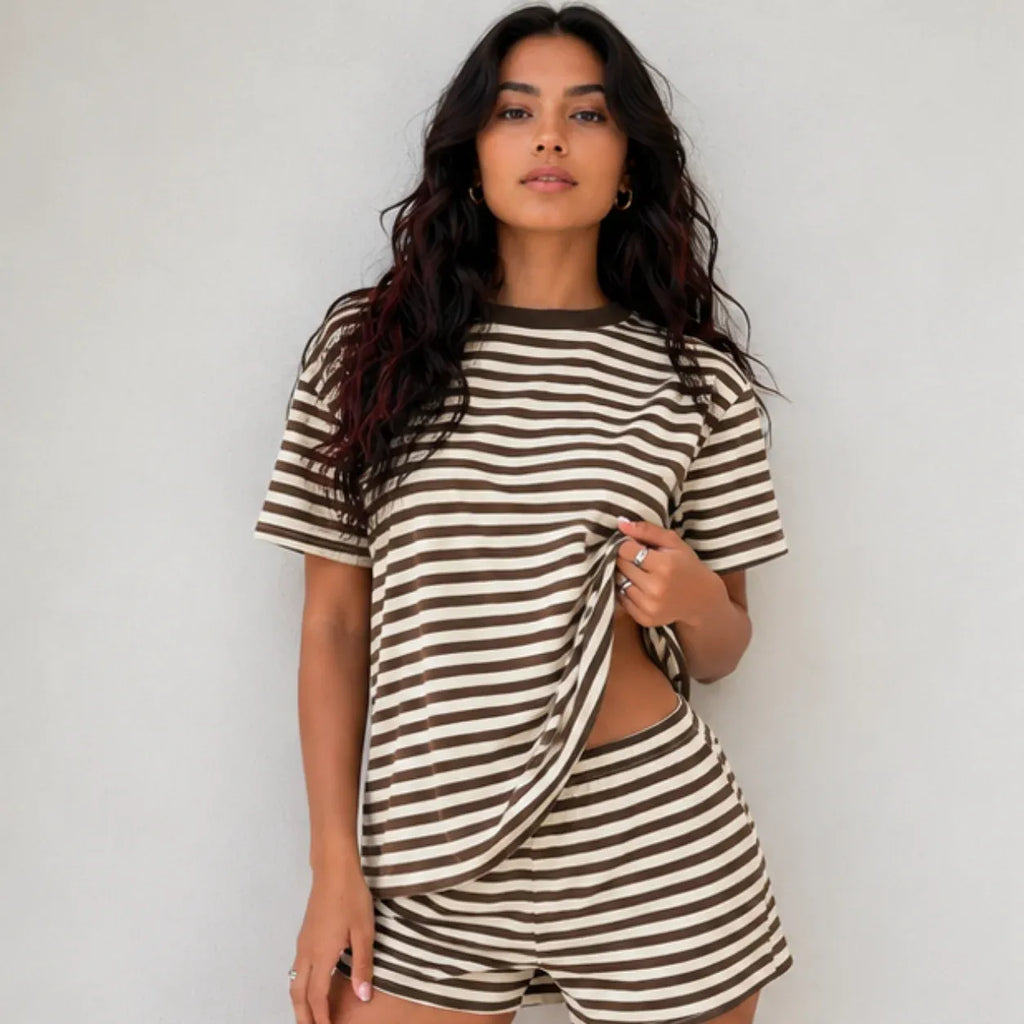 Woman wearing brown and cream horizontal striped short-sleeve top and matching shorts lounge set