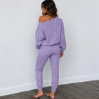 Back view of light purple cable knit sweater and pants set for women