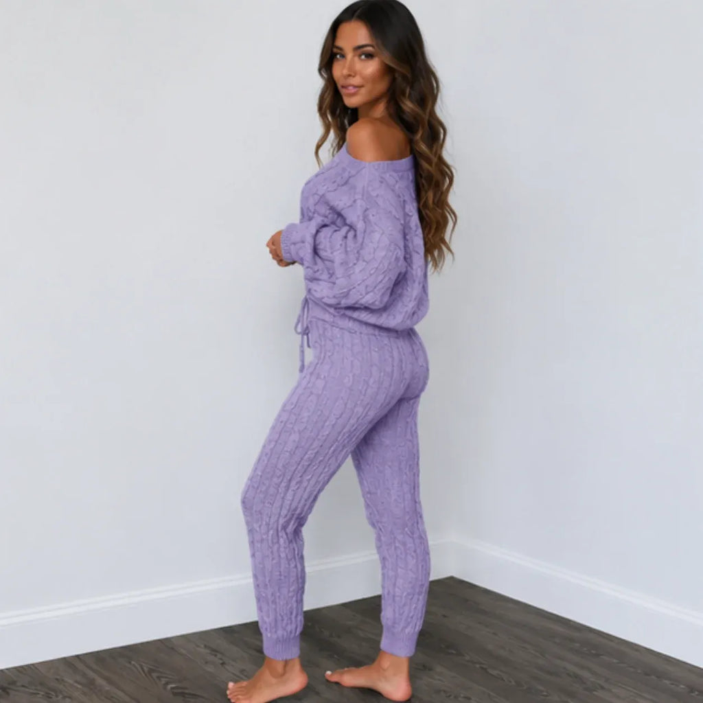 Side view of light purple cable knit sweater and pants set for women