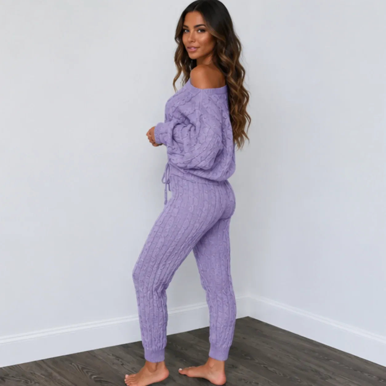 Side view of light purple cable knit sweater and pants set for women