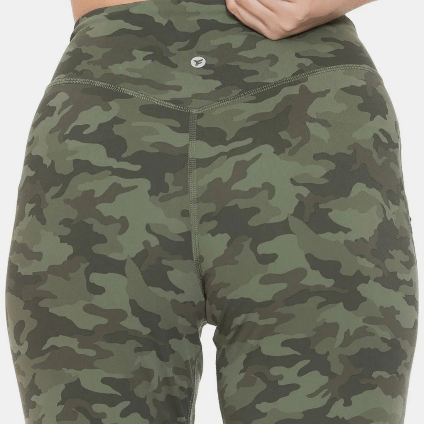 Logo view of high-waist camo leggings highlighting the flattering smoothing waistband.