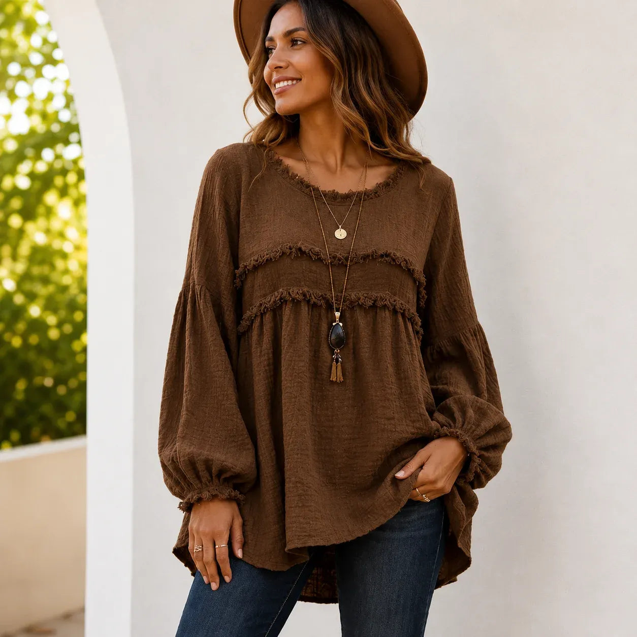 Women's brown Casual Long Sleeve Fringe Tassel Top featuring fringe tassel accents, textured woven fabric, long balloon sleeves, and a loose boho-inspired fit.