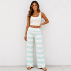 Model wearing mint green and white striped casual wide-leg pants