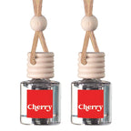 Two cherry scented car air fresheners with clear glass bottles, red labels, and light wood caps on a white background.