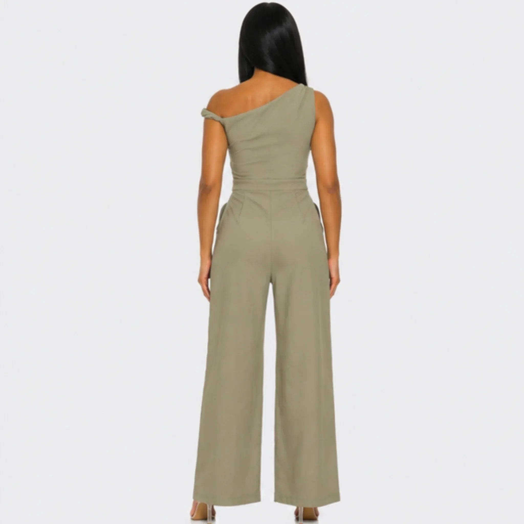Back view of the Chic Poise One-Shoulder Jumpsuit in khaki showcasing the elegant one-shoulder design and flowing wide-leg silhouette.