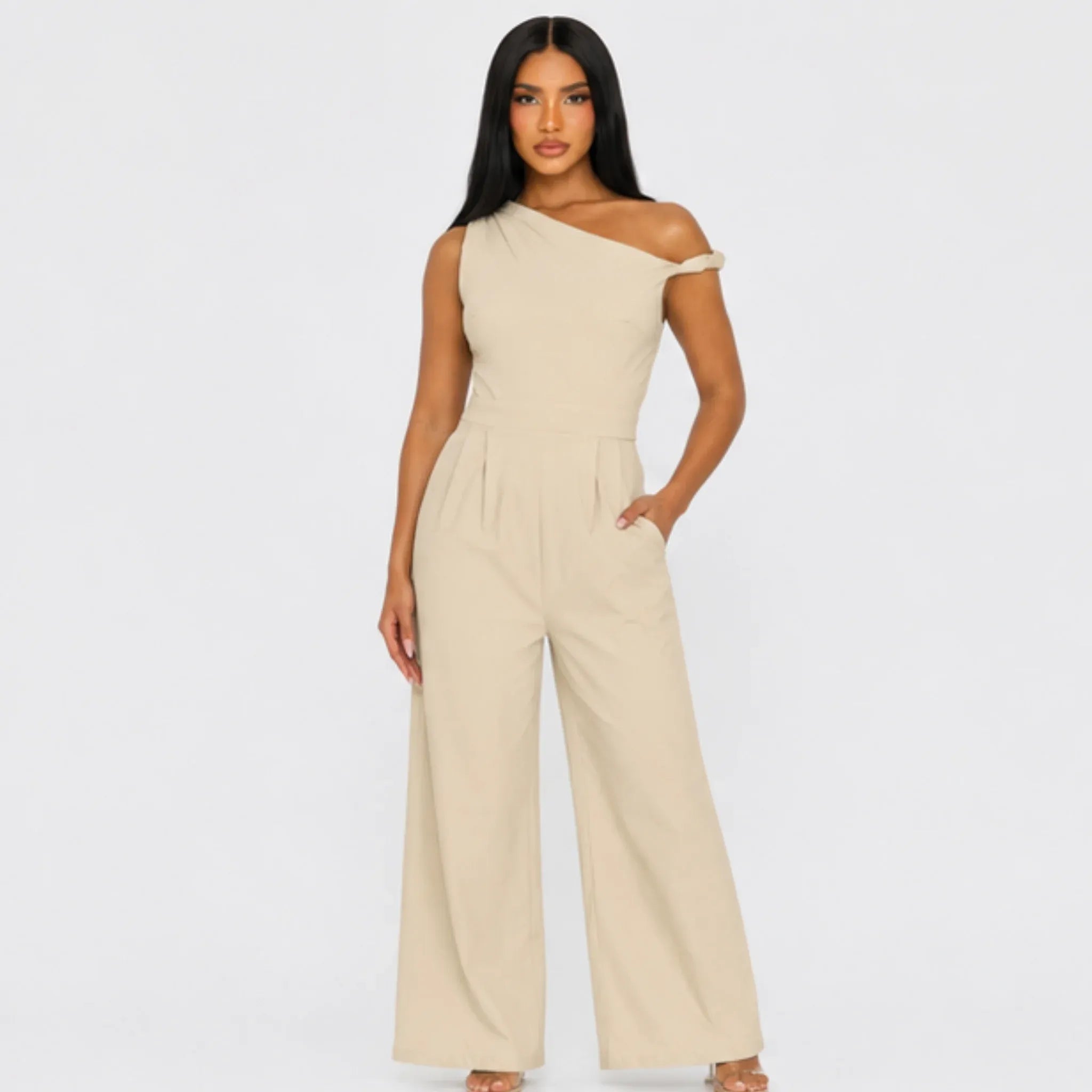 Chic Poise One-Shoulder Jumpsuit in stone featuring an asymmetrical neckline, tailored waist, wide-leg silhouette, and side pockets, front view.