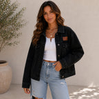 Front view of the women's Classic Loose Fit Denim Jacket in black featuring a relaxed fit, button-front closure, lapel collar, and chest flap pockets.