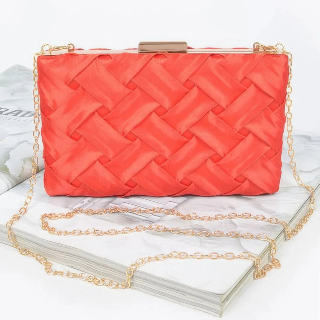 Crosshatch Chain Clutch Bag in red featuring a woven satin design, gold-tone frame closure, and detachable chain shoulder strap.