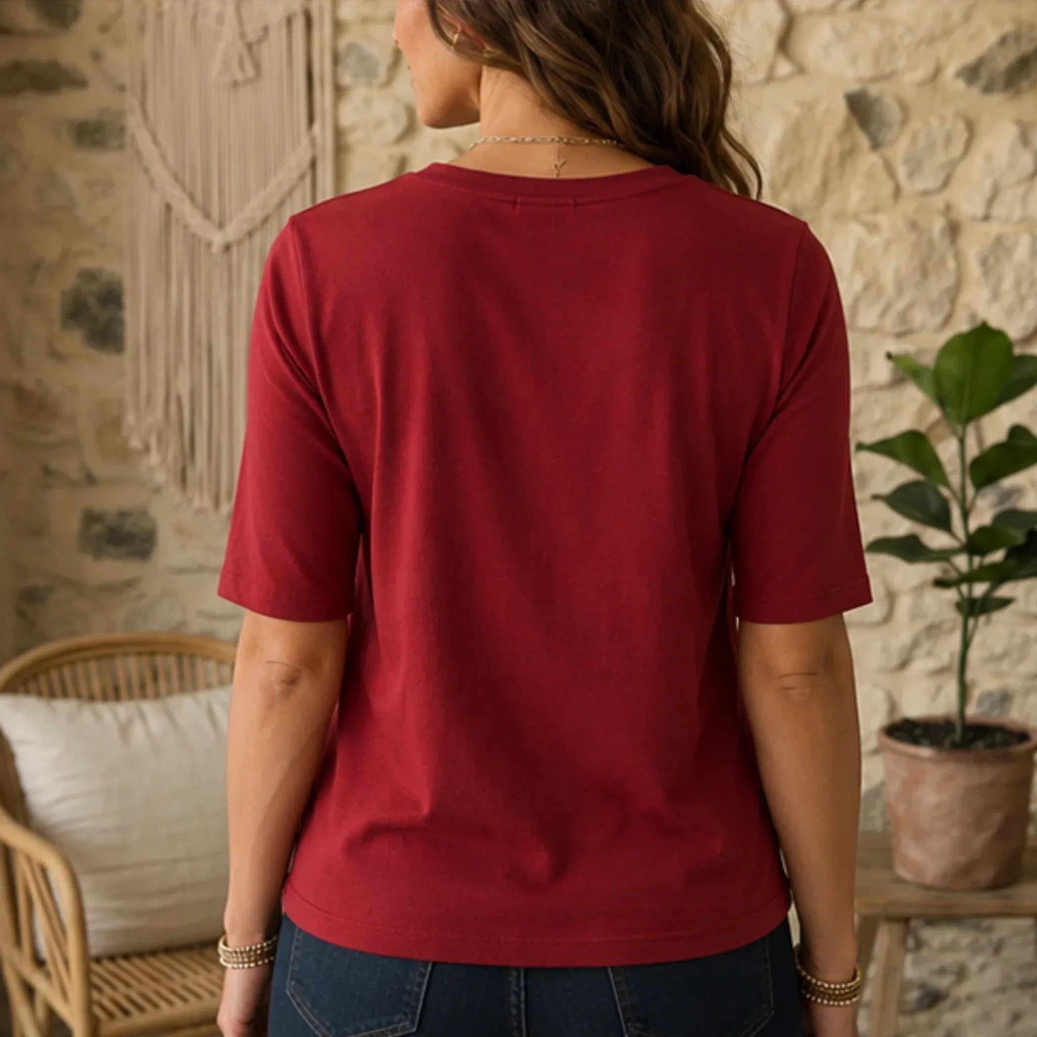 Back view of comfortable women's red crew-neck T-shirt