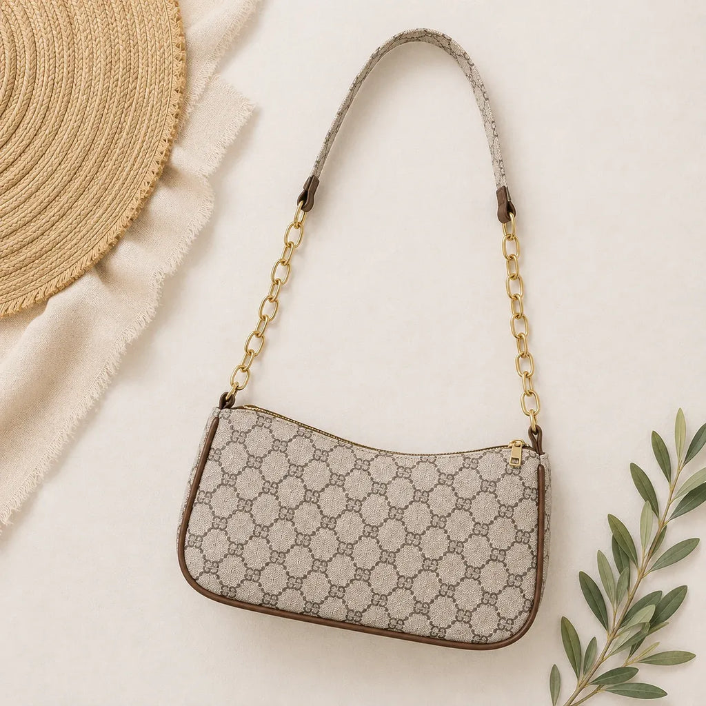 Light Brown Convertible Chain Strap Shoulder Bag with gold chain handle displayed on a neutral flat lay background.
