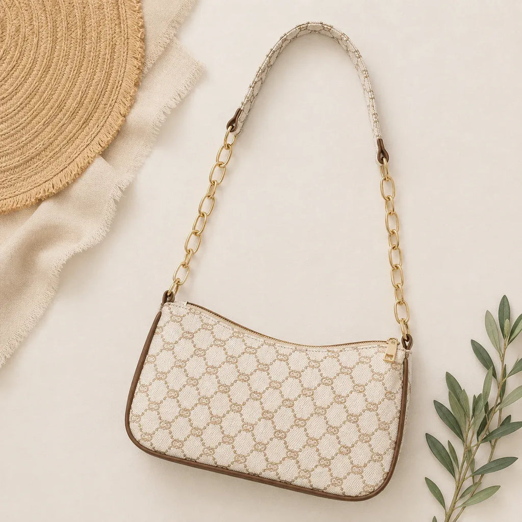 White Convertible Chain Strap Shoulder Bag with gold chain handle displayed on a neutral flat lay background.