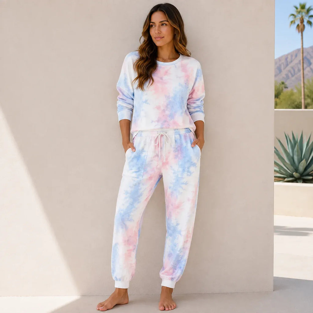 Women's cotton candy pastel tie-dye lounge set in pink and blue with matching jogger pants.