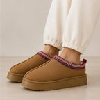 Brown Cozy Fleece-Lined House Slippers with a soft suede-look upper, plush fleece lining, embroidered trim, and lightweight platform sole.