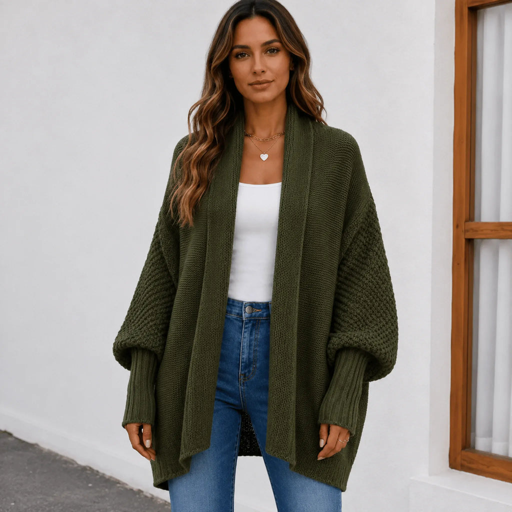 Women's army green cozy knitted lapel cardigan sweater with a relaxed oversized silhouette, shawl lapel, and ribbed cuffs.