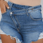 Close-up of the crossover waistband and distressed denim detailing on the women's Criss Cross High Waist Distressed Denim Shorts.