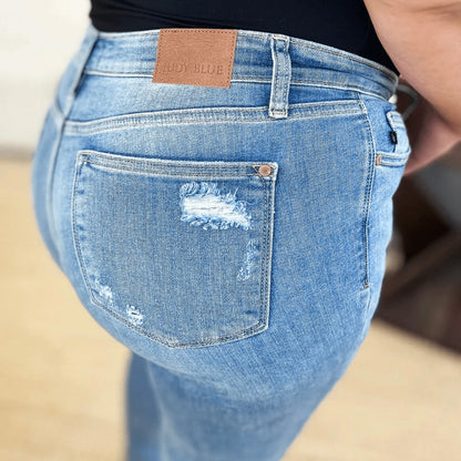 Detailed shot of the cuffed hem on Judy Blue medium wash jeans.