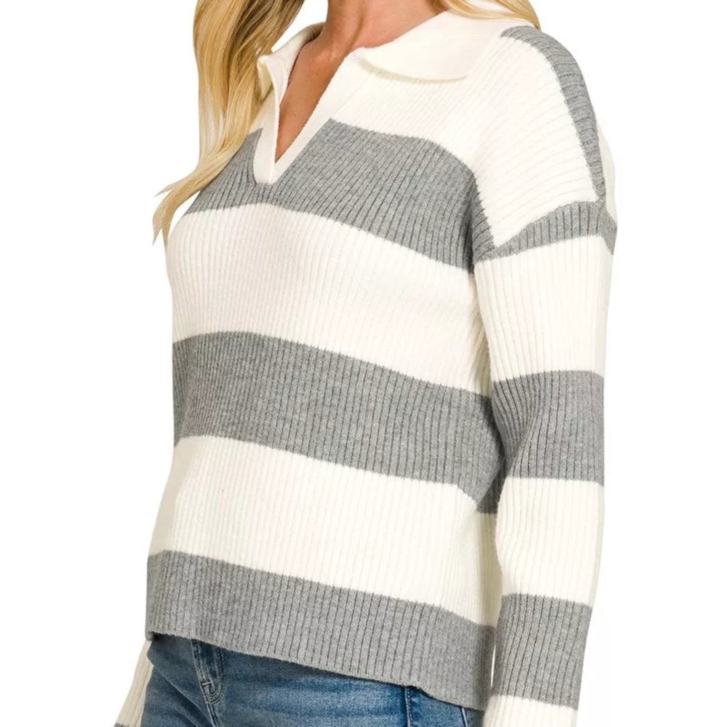 Close up detail of the open collar neckline and premium striped knit fabric from Solazura Boutique