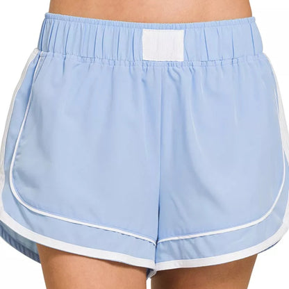 Zenana Soft Woven Lined Dolphin Shorts in Light Blue - Front View