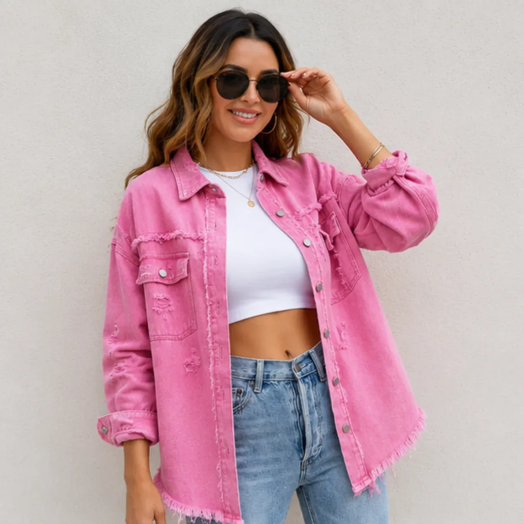 Women's pink distressed denim shacket with frayed hem and button front