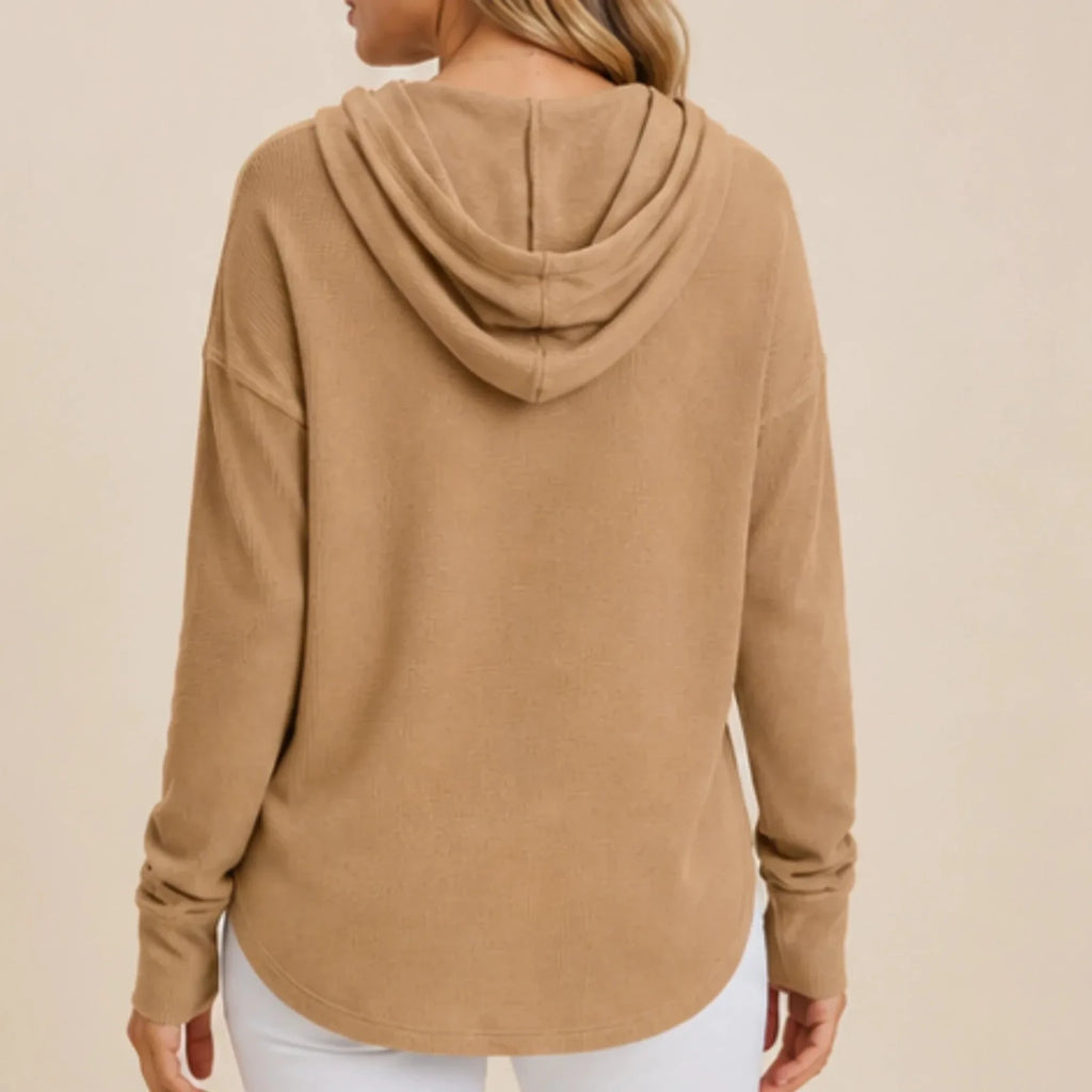 Back view of women's camel drop shoulder waffle knit hoodie showcasing the relaxed silhouette, crossover hood and soft waffle knit texture.