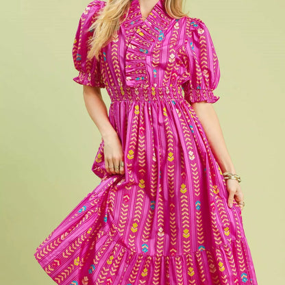Front view of a breezy pink Umgee midi dress with a stretchy smocked bodice from Solazura Boutique