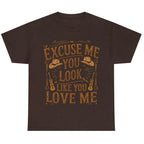 Dark chocolate graphic t-shirt featuring the "Excuse Me You Look Like You Love Me" western-inspired graphic with cowboy hats and guitars.