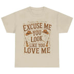 Sand graphic t-shirt featuring the "Excuse Me You Look Like You Love Me" western-inspired graphic with cowboy hats and guitars.