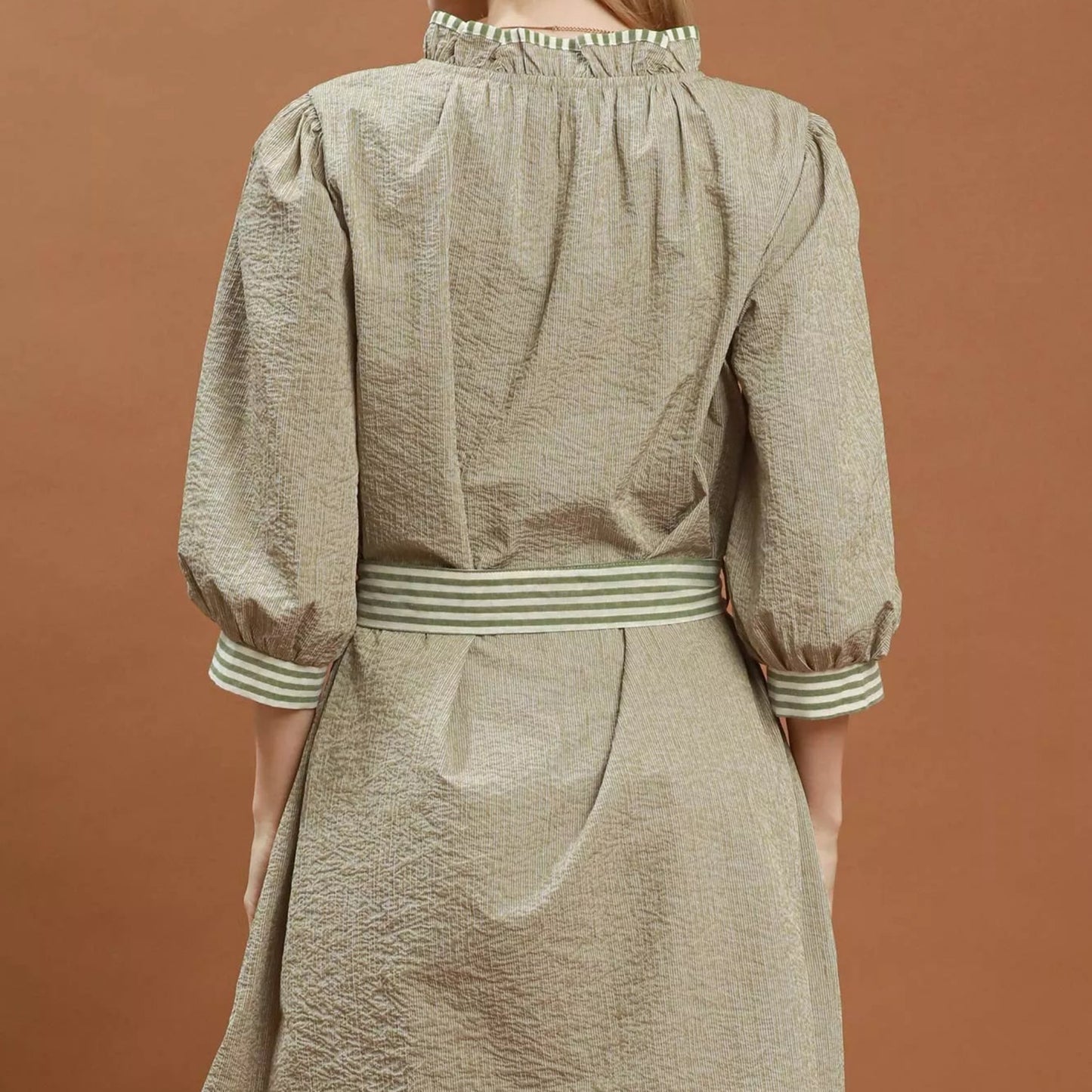 Back view of the Umgee contrast trim mini dress showing rear fit from Solazura Boutique