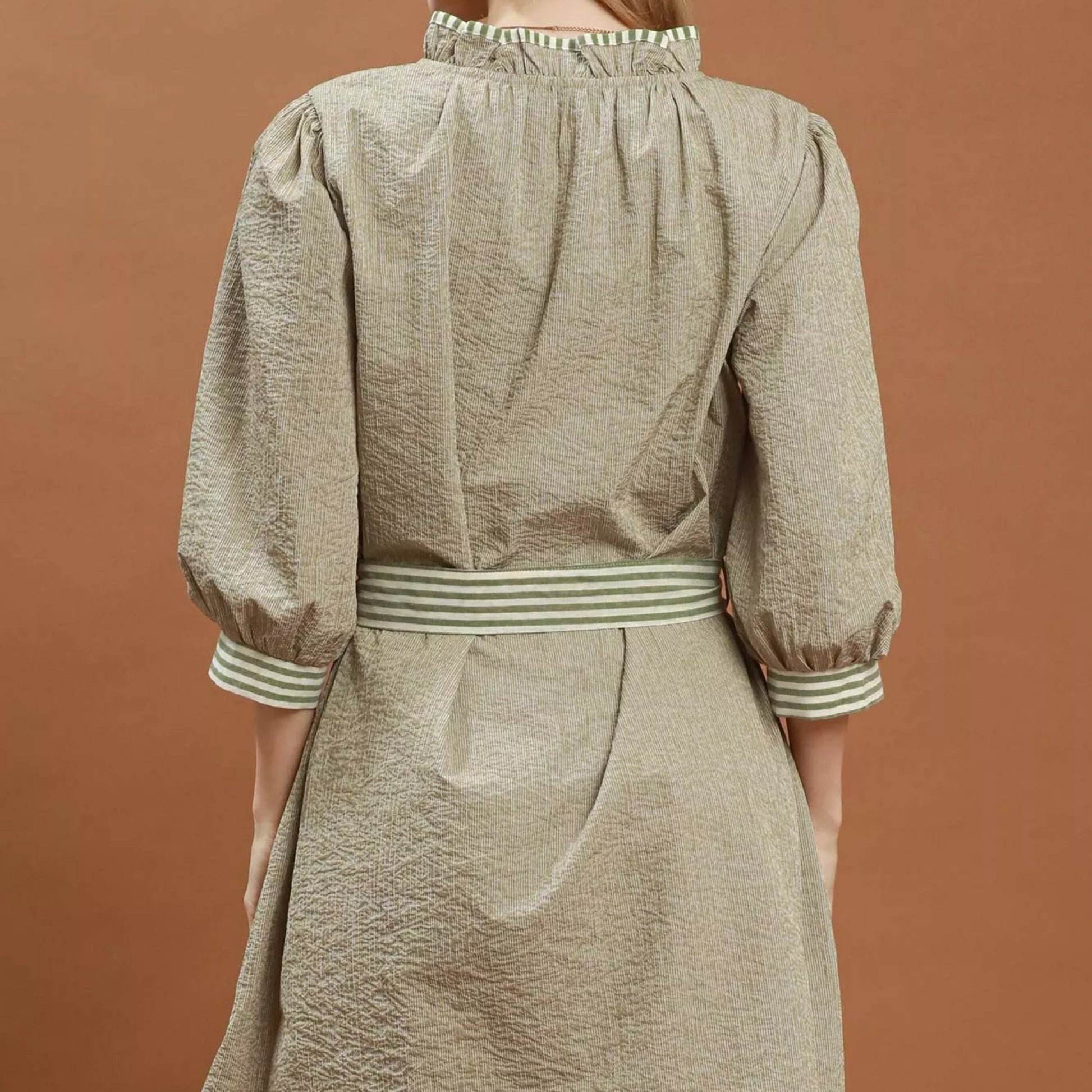 Back view of the Umgee contrast trim mini dress showing rear fit from Solazura Boutique