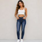 Fleece-lined mid-rise skinny jeans in blue shown from the front