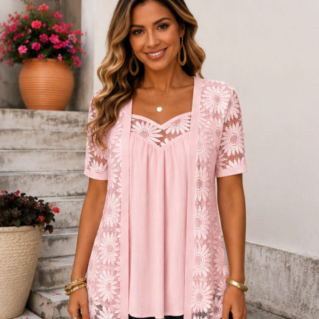 Women's pink floral lace mesh hollow-out faux layered short sleeve boutique top front view.