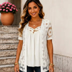 Women's white floral lace mesh hollow-out faux layered short sleeve boutique top front view.
