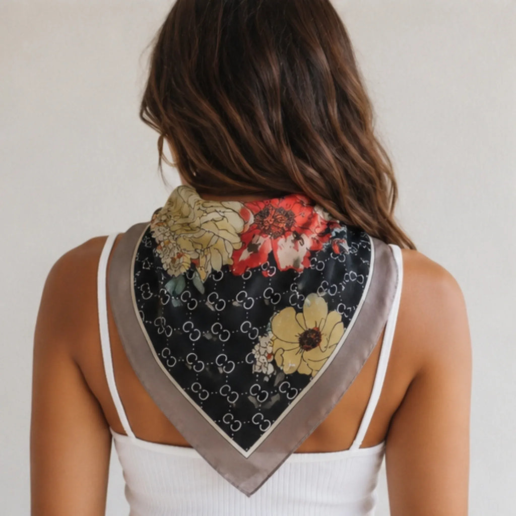 Back view of the Women's Floral Printed Bandana Scarf in Black highlighting the square floral print and elegant drape.