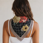 Back view of the Women's Floral Printed Bandana Scarf in Black highlighting the square floral print and elegant drape.
