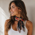 Side view of a Women's Floral Printed Bandana Scarf in Black showcasing a lightweight floral neck scarf with a soft silky finish.