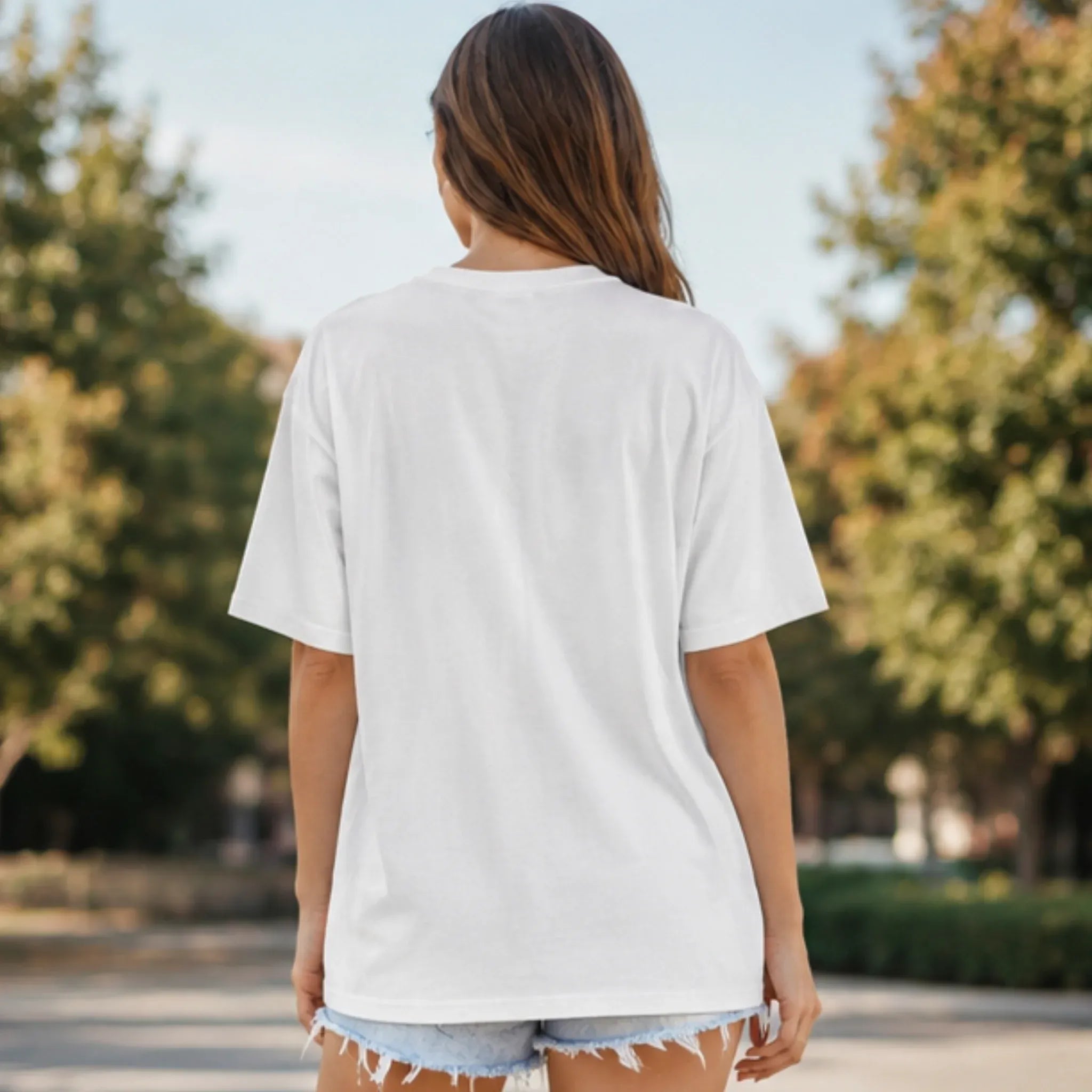 Back view of the white Fresh Cherries Graphic Oversized T-Shirt with oversized relaxed silhouette.