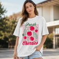 Women's Fresh Cherries Graphic Oversized T-Shirt front view in white with vintage cherry graphic.