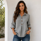 Women's gray linen blend button-front blouse with collared neckline, rolled sleeves, and relaxed fit.