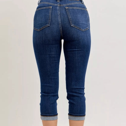 Back view of high-waist summer capri jeans with classic pocket styling.